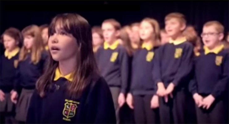 10-year-old girl with autism moves the audience to tears at a Christmas concert